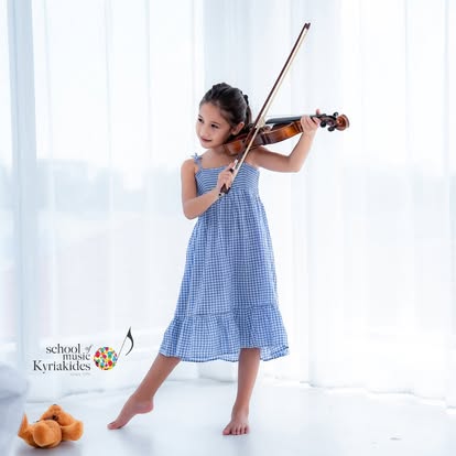 Strings lesson at the school